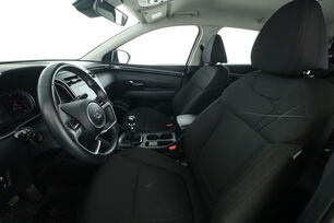 Interior lado del conductor desde el asiento trasero